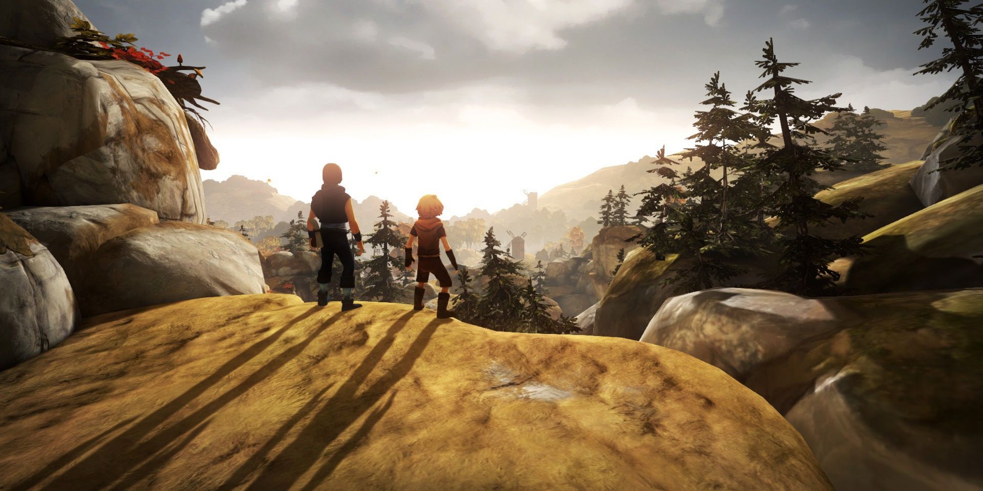 A screenshot showing Naiee and Naia overlooking a forest landscape in Brothers: A Tale of Two Sons