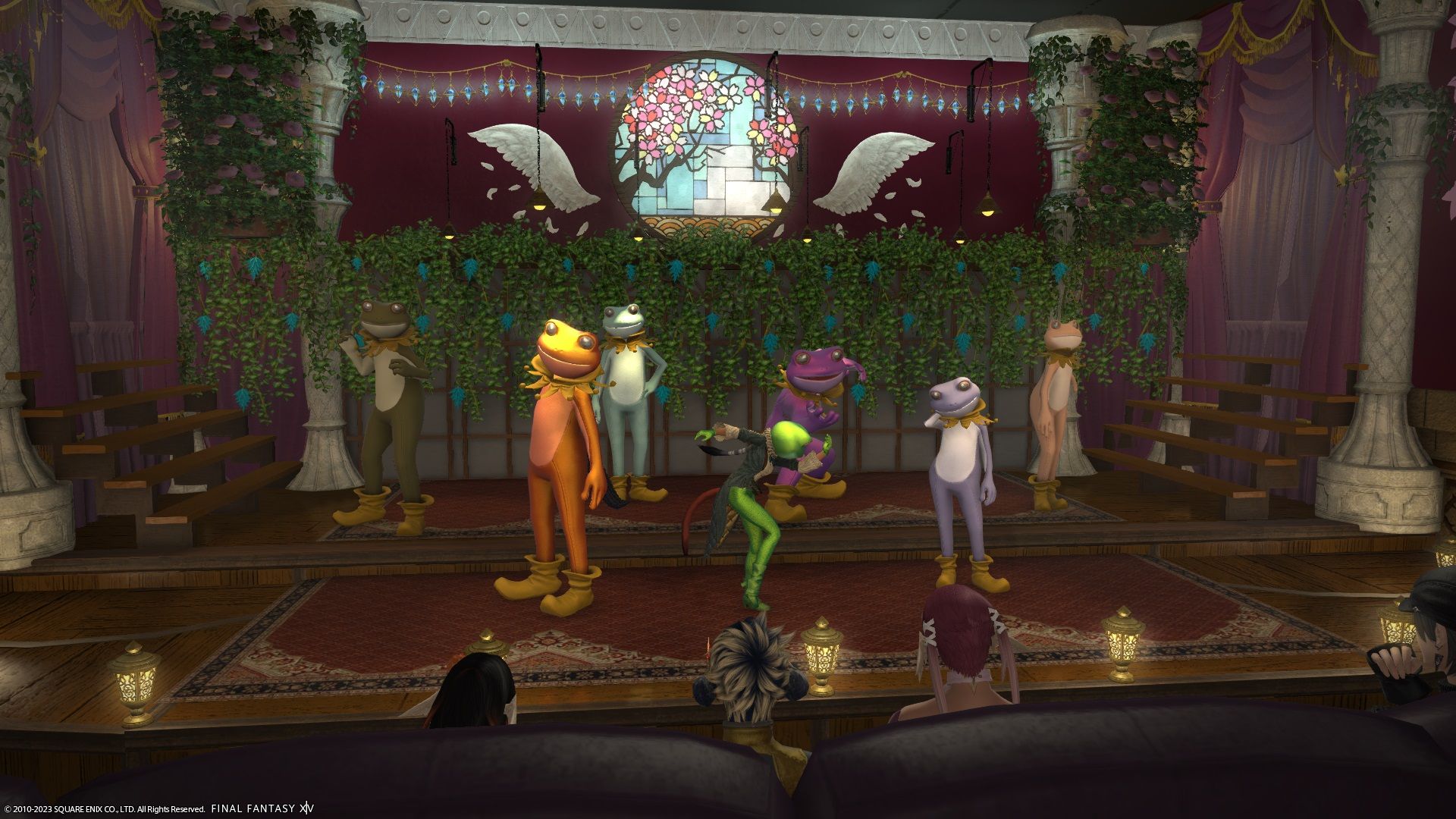 Final Fantasy 14 - The Esprit troupe on stage as frogs.