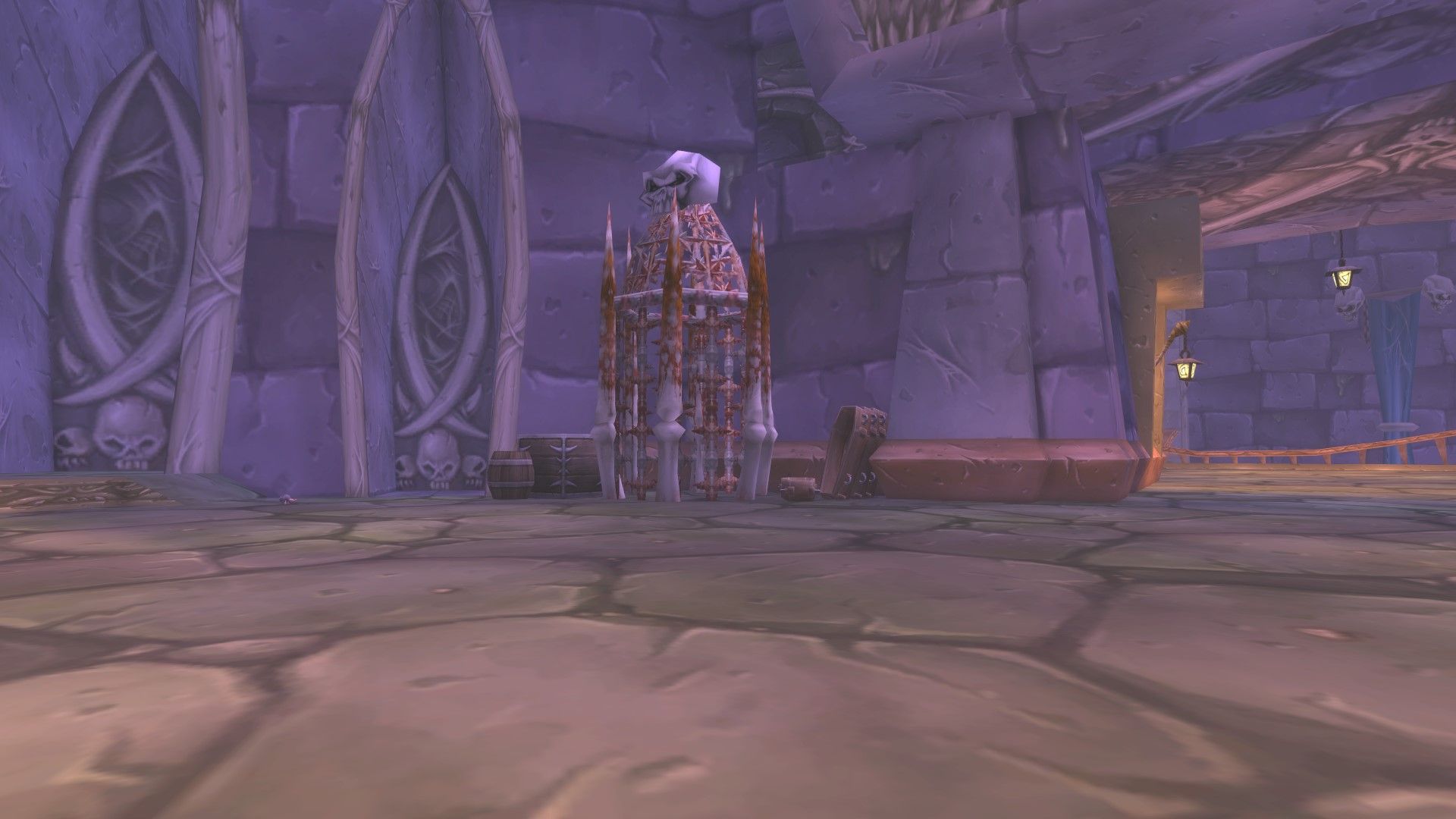 A bone cage against a stone wall within the dread citadel of Naxxramas