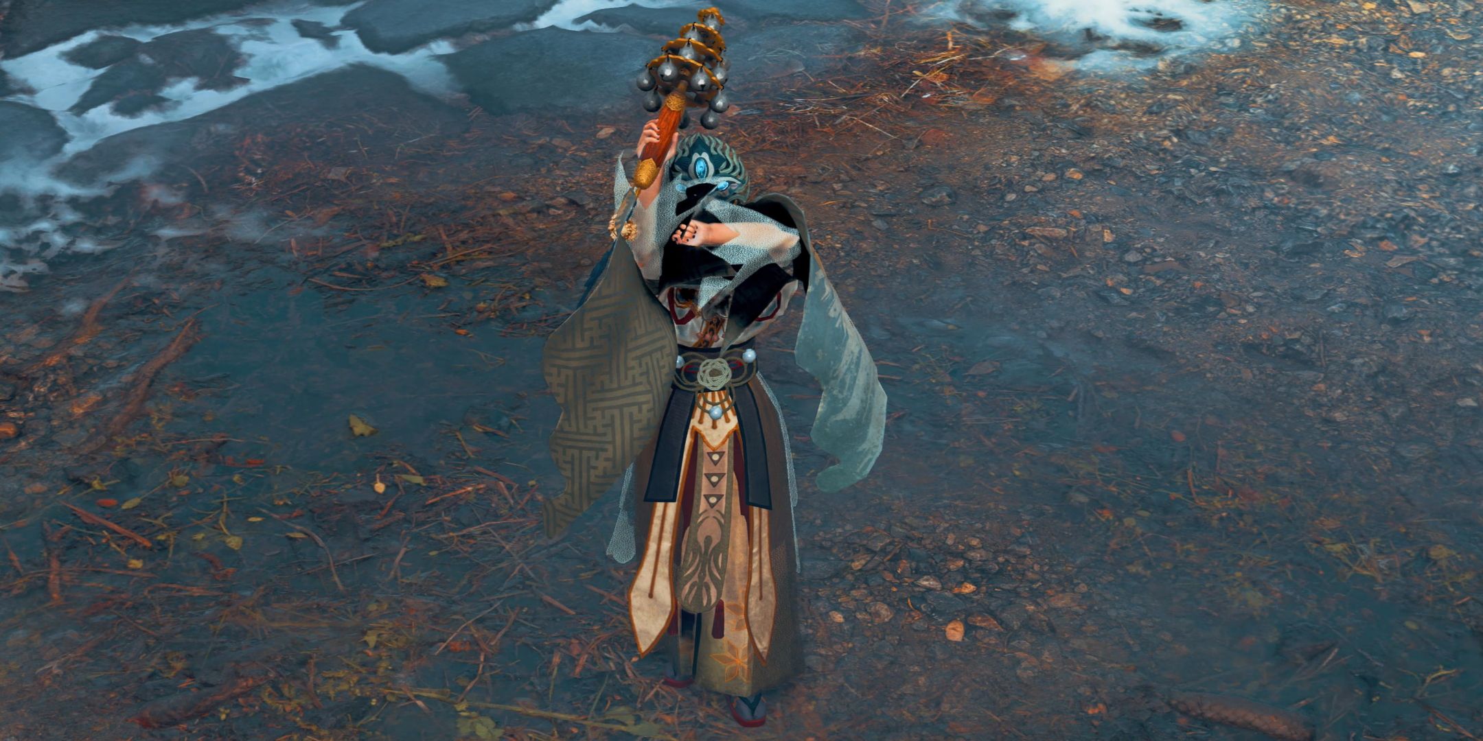 Kunitsu-Gami Path of the Goddess. The Shaman standing in a snowy area.