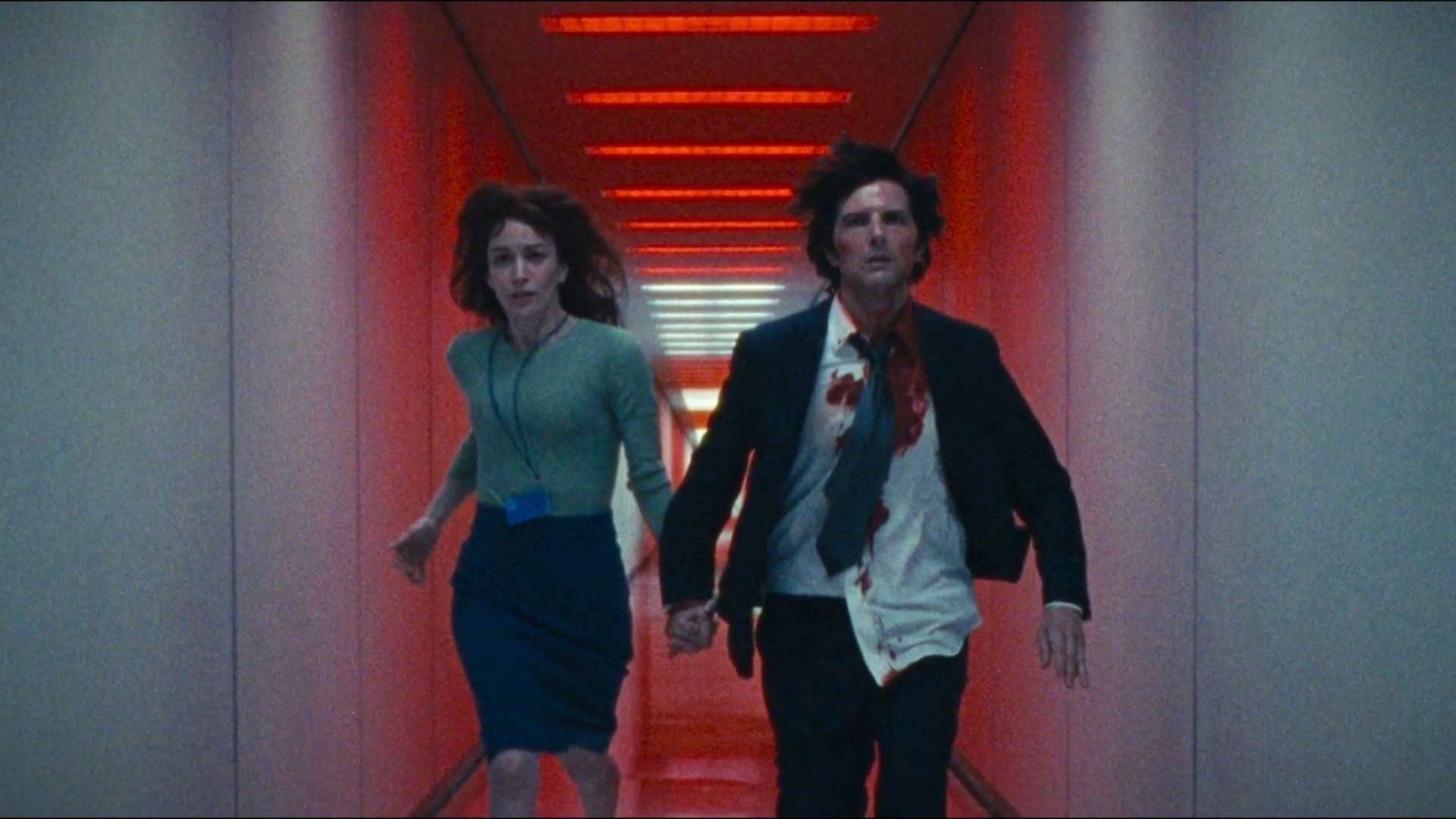 Helly R and Innie Mark Running Back Inside Lumon In 'Cold Harbor' From Severance.