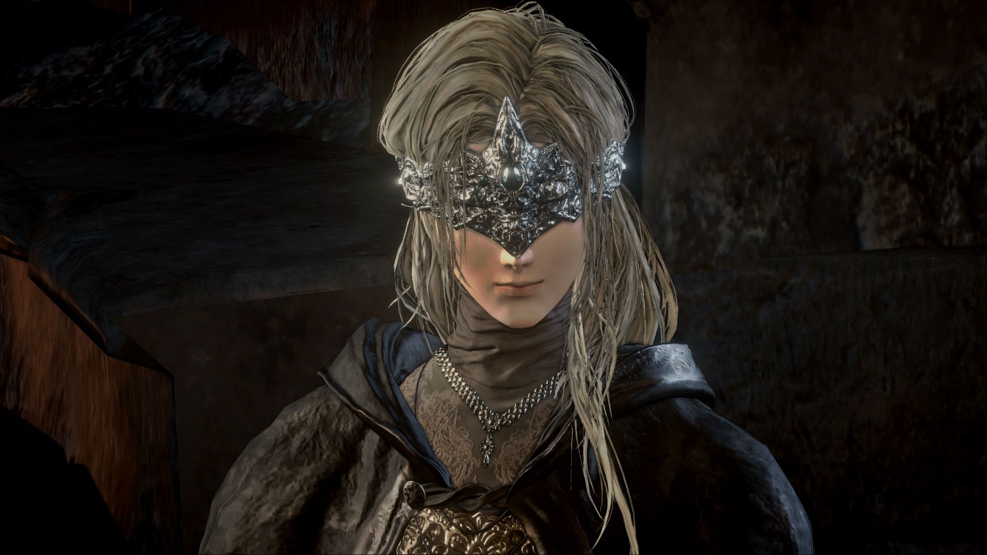 A closeup of the Firekeeper from Dark Souls 3 with a slight smile on her face as she greets the Ashen One.