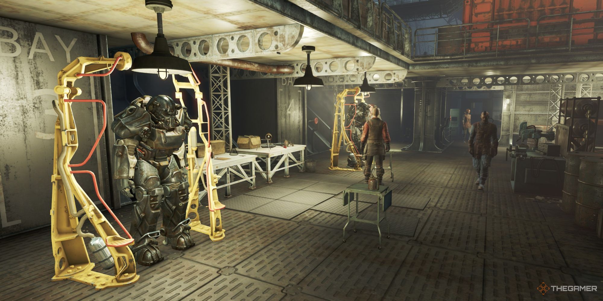 Fallout 4 A room filled with Power Armour being mended inside the Prydwen