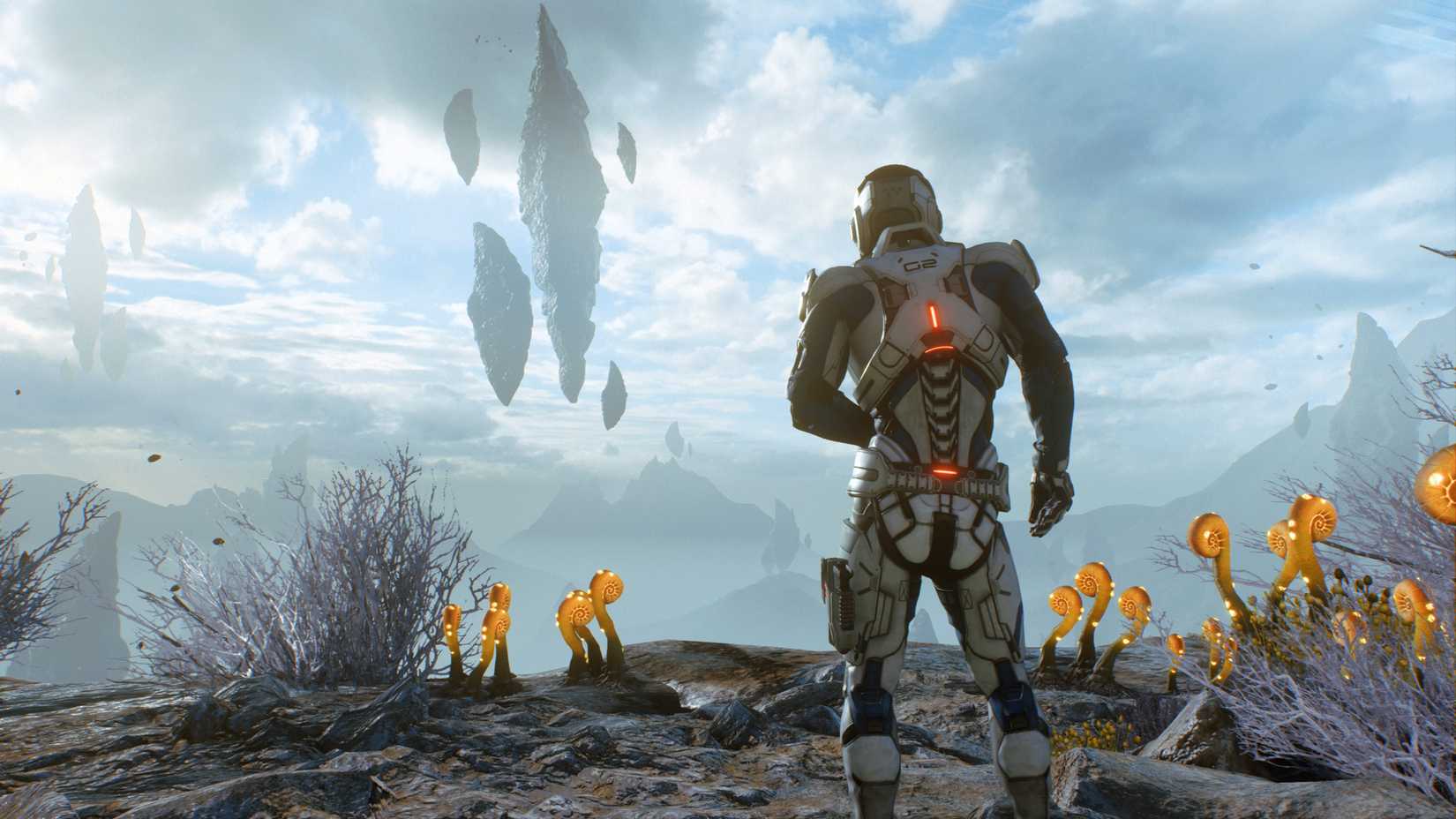 Ryder looks at floating rocks in the distance in Mass Effect Andromeda.