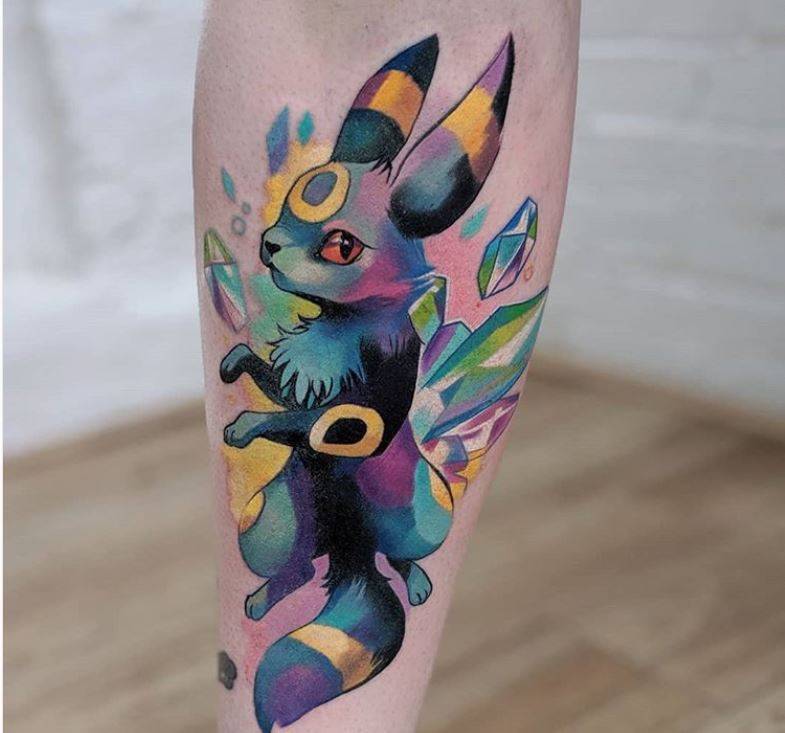 pokemon card tattoo Mimikyu card tattoo ! Was a really fun piece to do! We had an enjoyable time talking about pokemon and trading cards during this session! We have a lot of cards