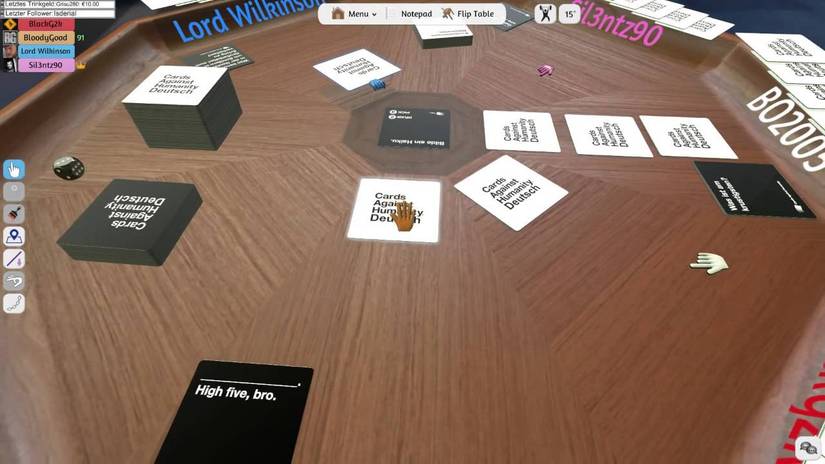 Player who plays a card against humanity in a table simulator. 