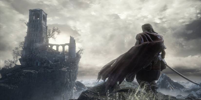 A Mercenary looking out toward the Firelink Shrine in Dark Souls 3.