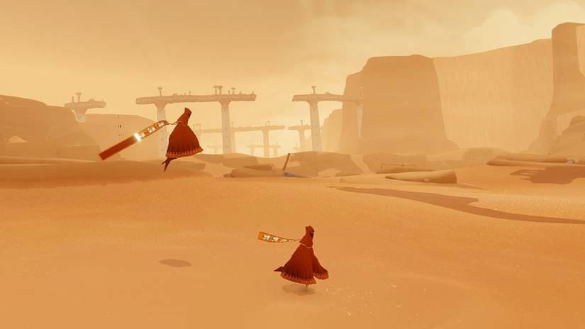 Two players playing together in Journey.