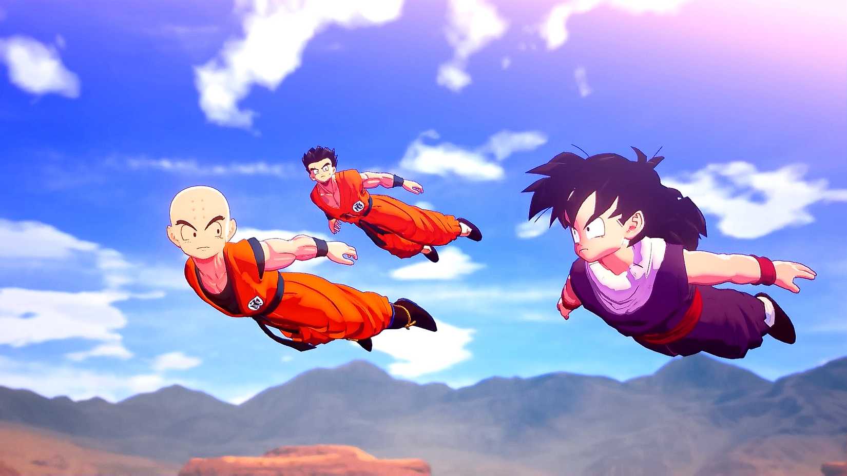 Gohan, Krillin, and Yamcha flying through the air in Dragon Ball Z Kakarot.