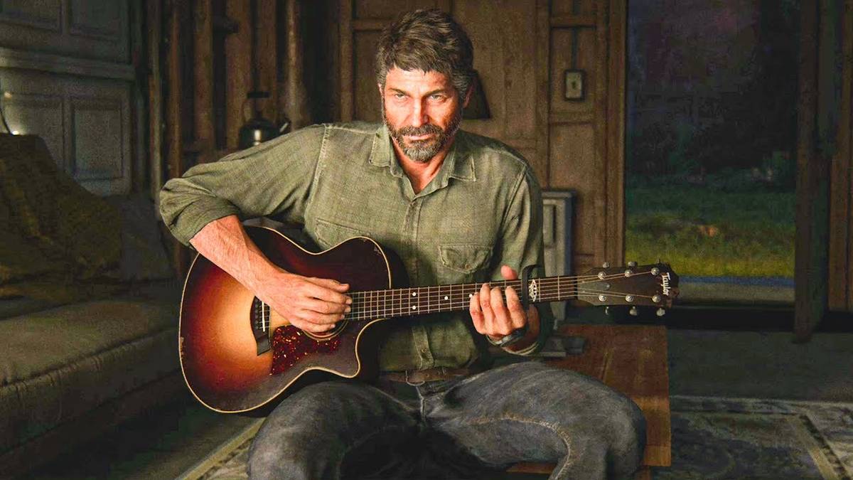 Joel with a guitar in The Last of Us.