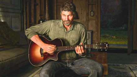 Joel with a guitar in The Last of Us.