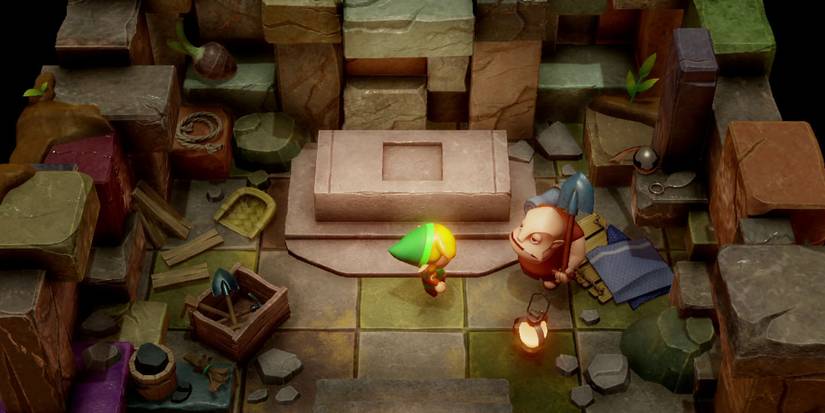 Link talking to Dampé in a crowded room in Link's Awakening