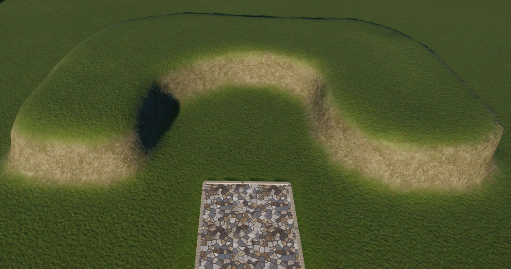 Planet zoo raised terrain in horseshoe shape with path down the centre.