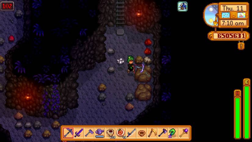 stardew valley player mining for resources in caves