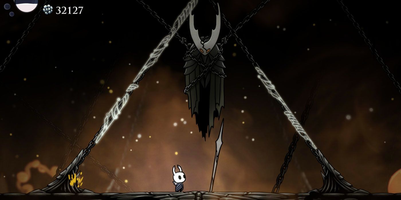 Luta contra chefe em Hollow Knight com partículas e ação — Os Melhores Metroidvanias de Todos os Tempos — Jaeplay