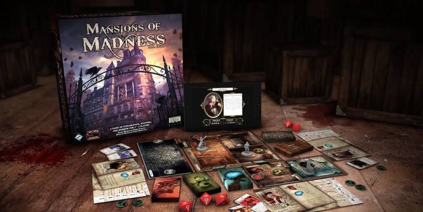 A mansion of madness boxes with all components, including dice, mini, cards and boards.