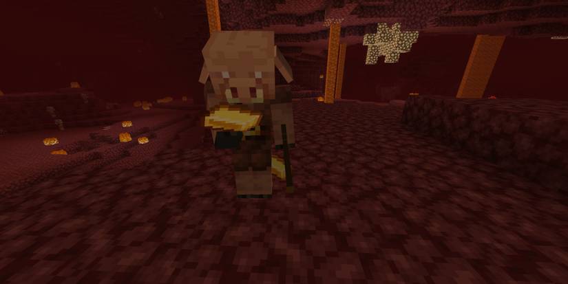 piglin inspecting a gold bar for bartering