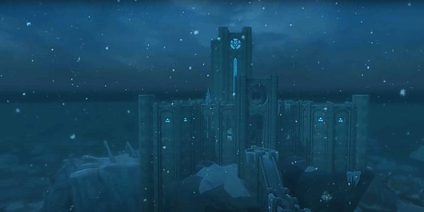 A large, stone college stands over a frozen crater.