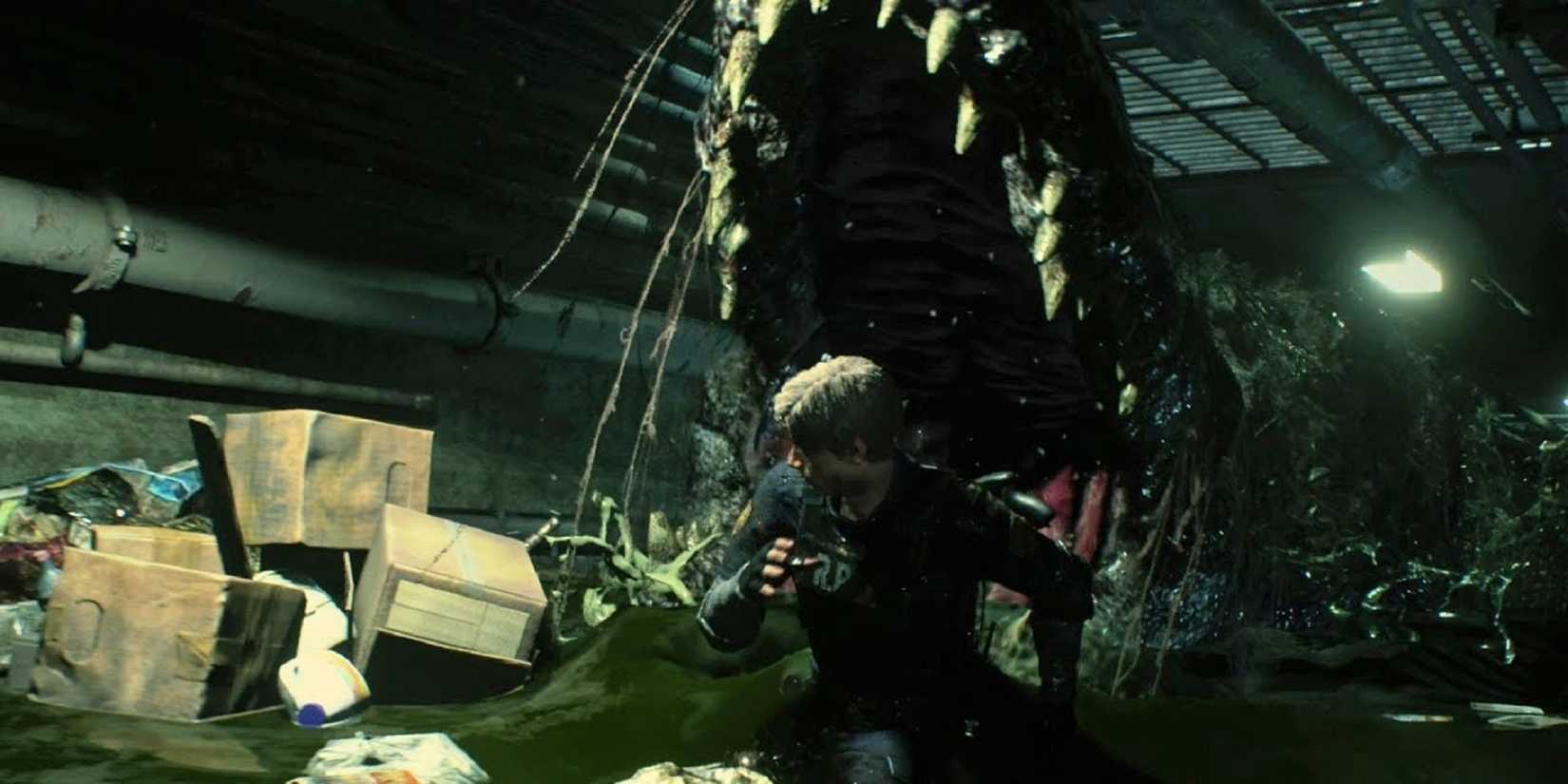 Leon running through green swampy sewage water as a giant infected Alligator tries to eat him in Resident Evil 2.