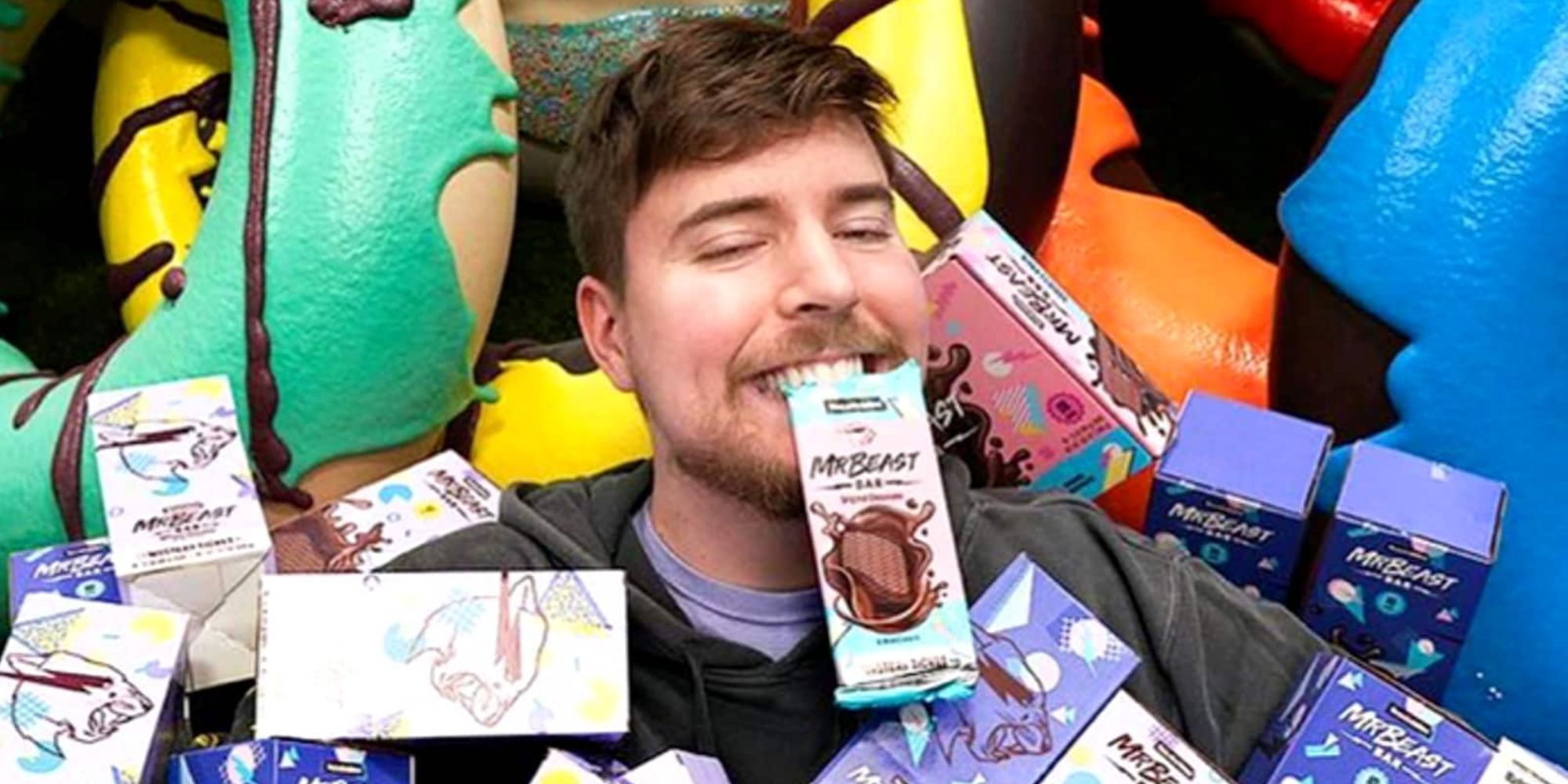 mrbeast biting a feastables bar