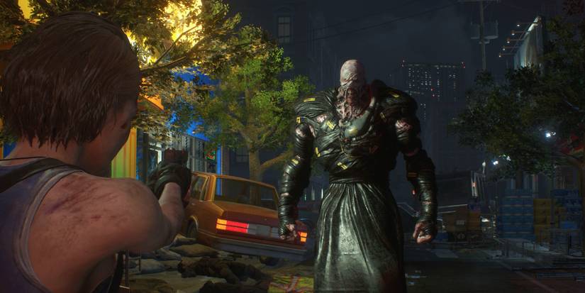 Jill pointing gun at Nemesis in the center of the street nearby cars and rubble in Resident Evil 3 Remake.