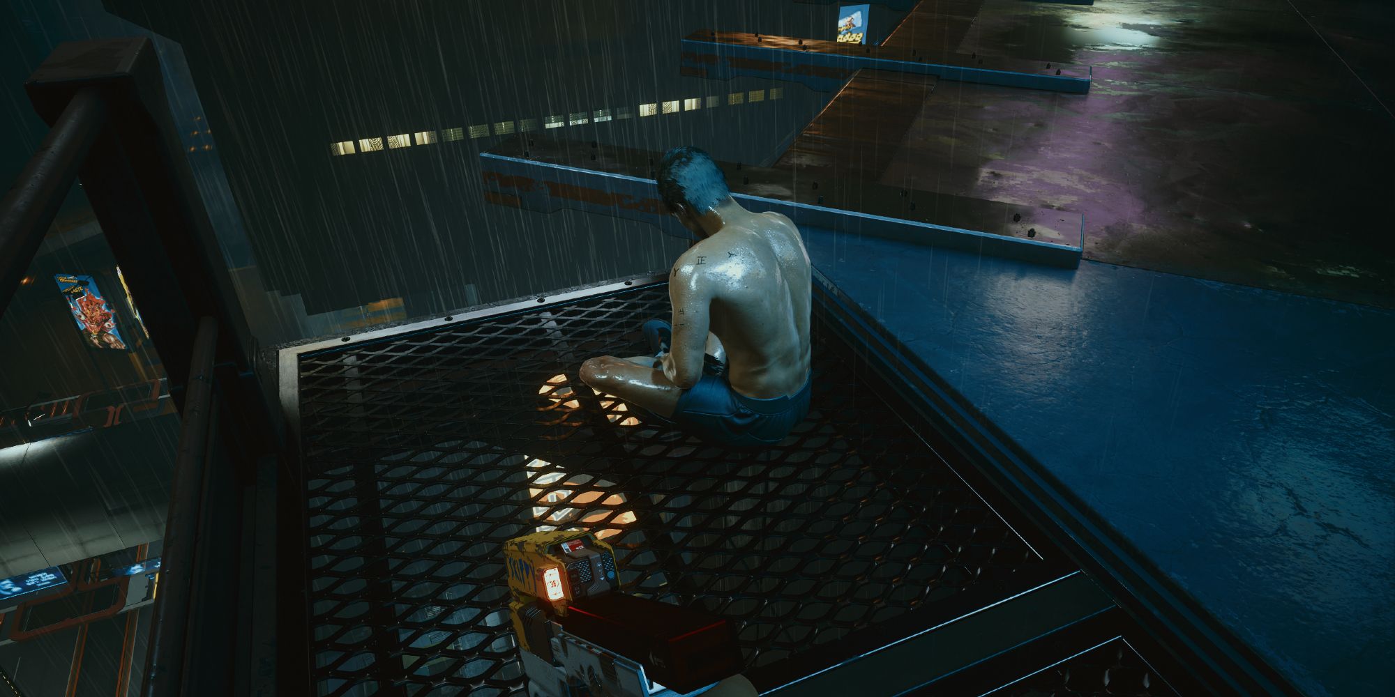 Man sitting under the rain in a building terrace in Cyberpunk 2077.