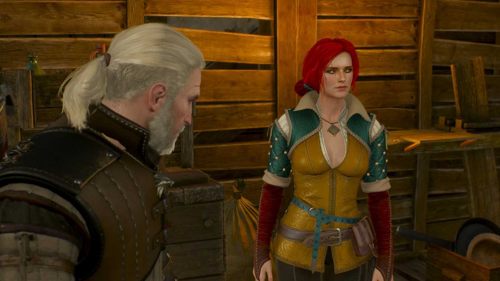Geralt and Triss talk in a disused cabin in Novigrad.
