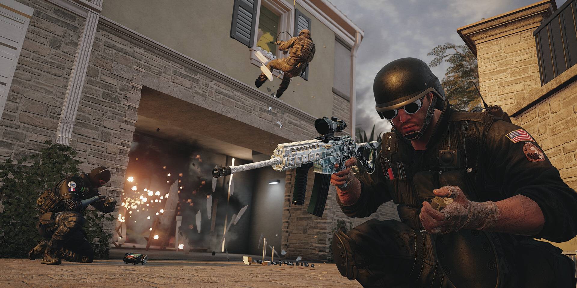 Image of a team of soldiers breaching a house in Rainbow Six Siege.