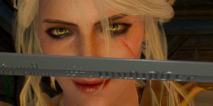The Witcher 3 screenshot of Ciri looking at her new sword with a smile on her face.