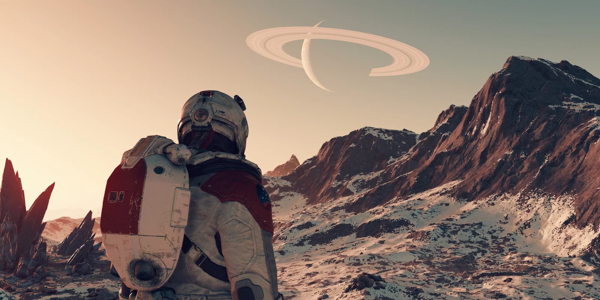 On a snow mountain, a space traveler looks up to see another planet in the distance in Starfield.