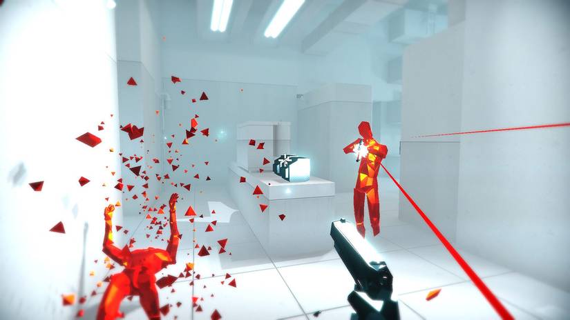 A sharp rendering of a white room with a red man aimed at players in Superhot.
