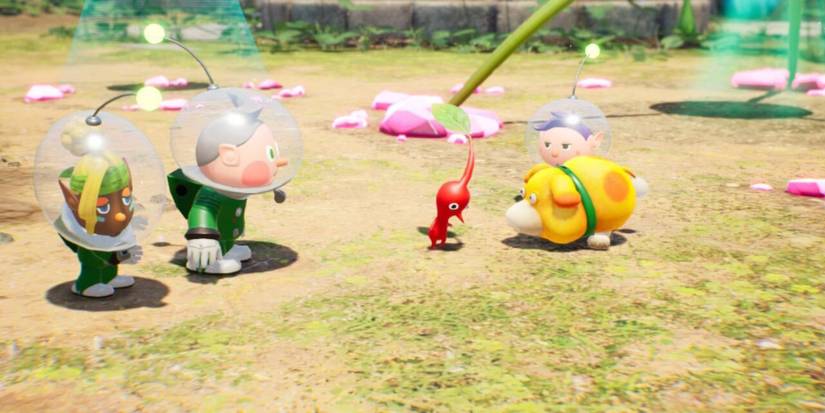 oatchi sniffing a red pikmin in pikmin 4