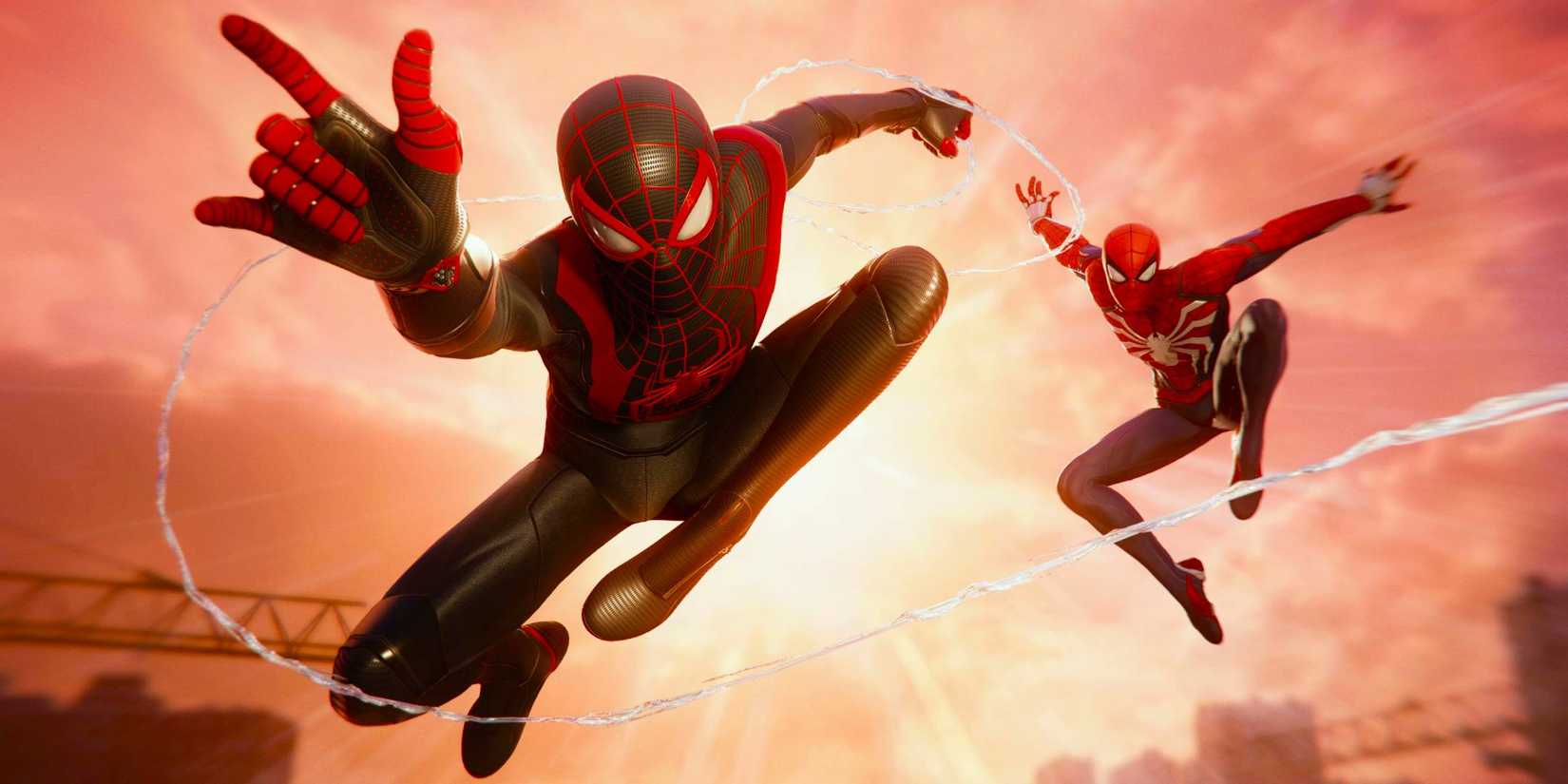 A screenshot from Marvels Spider-Man 2 of Peter Parker and Miles Morales as Spider-Man swinging towards the camera.