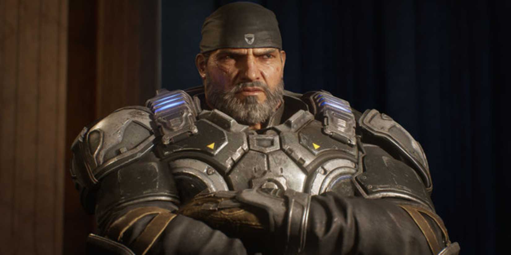 gears 5 older marcus looking cross with arms folded.