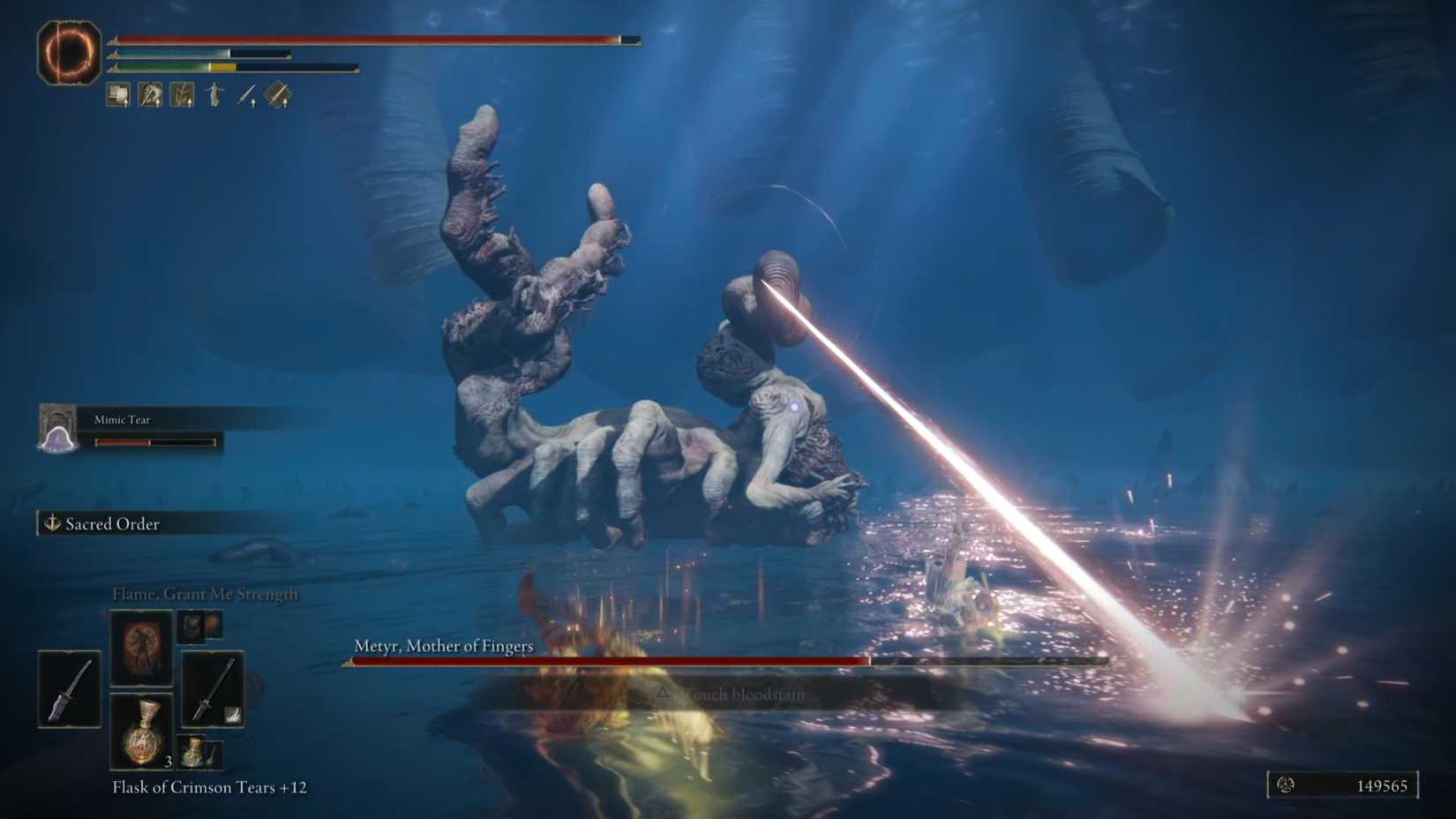 The mother of the finger, in the middle of her boss, fires a laser beam from the head -shaped finger, fighting in Erdree's Elden Ring Shadow