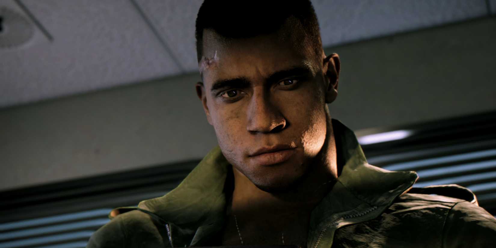 Mafia Lik Lik looking down with shadows on his face.