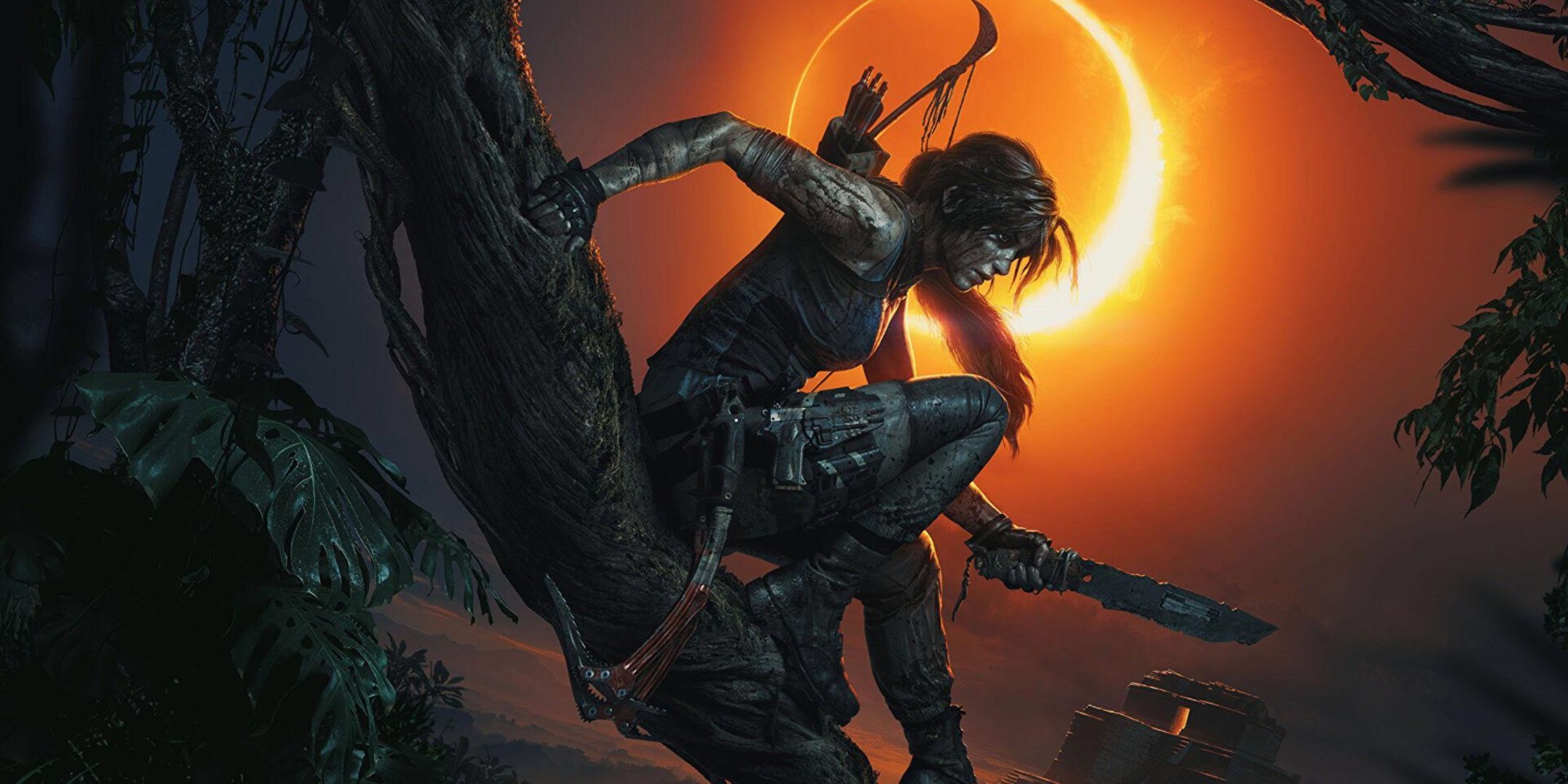 Lara Croft holds a knife in Shadow of the Tomb Raider.