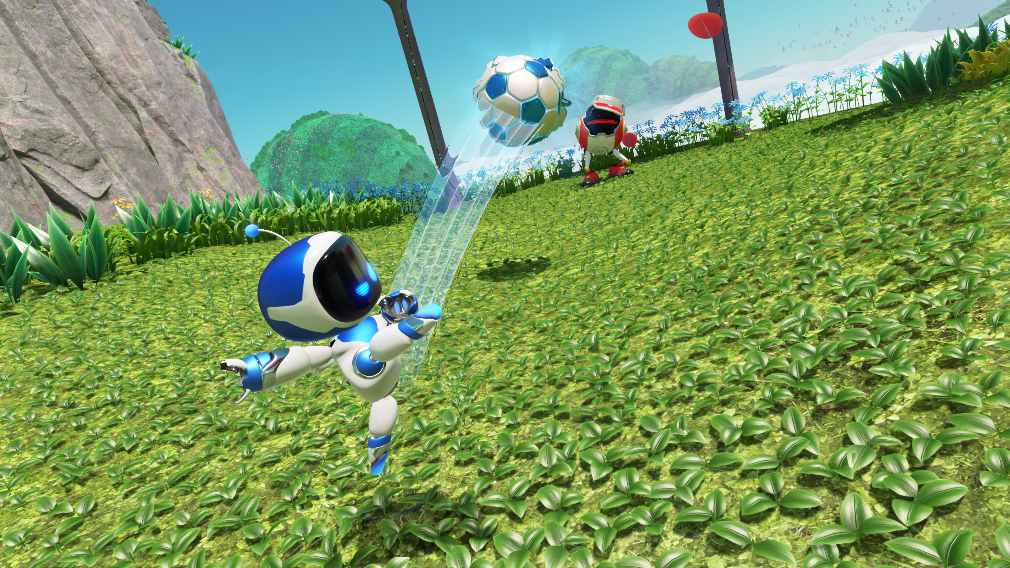 Astro Bot kicking a football