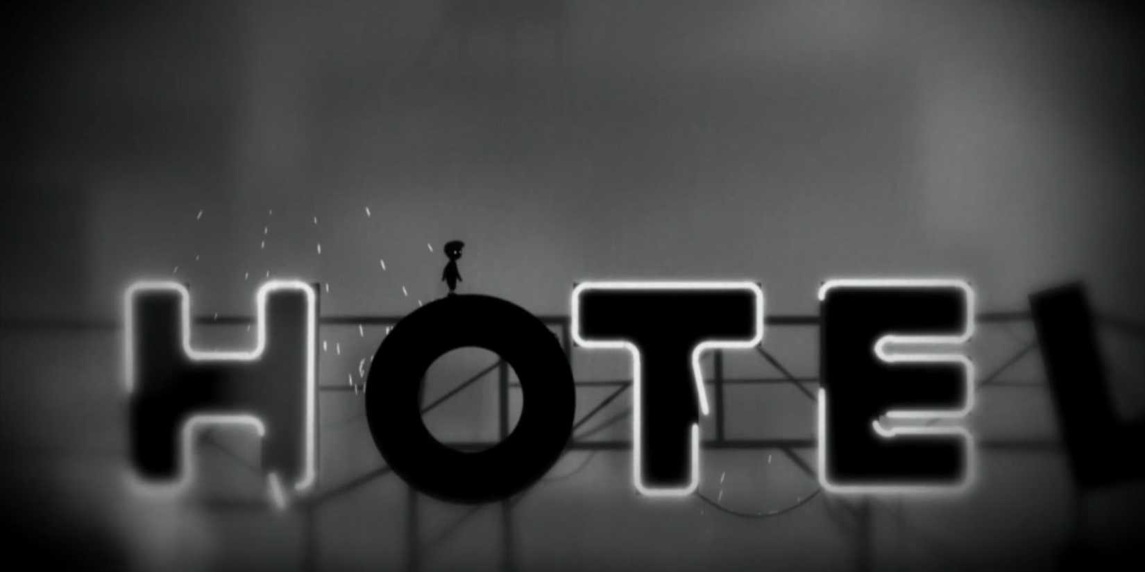 A boy in limbo walking across a huge neon sign that says hotel.
