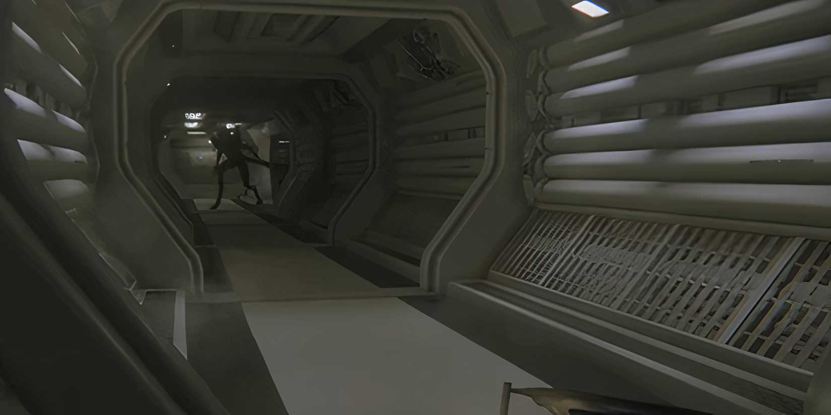 The monster in Alien: Isolation walking through the corridor of the station.