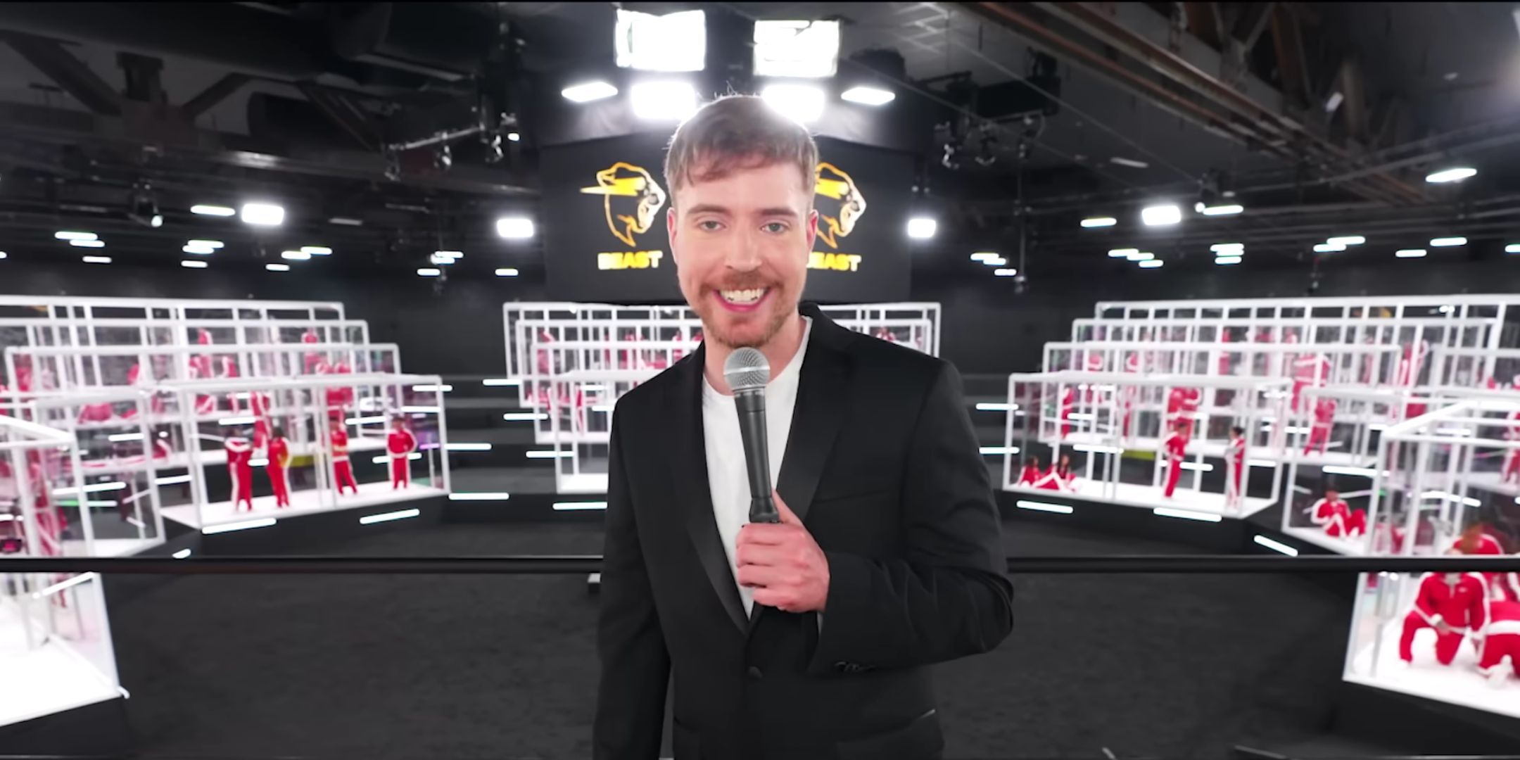 Jimmy Donaldson, also known as MrBeast, holding a microphone.