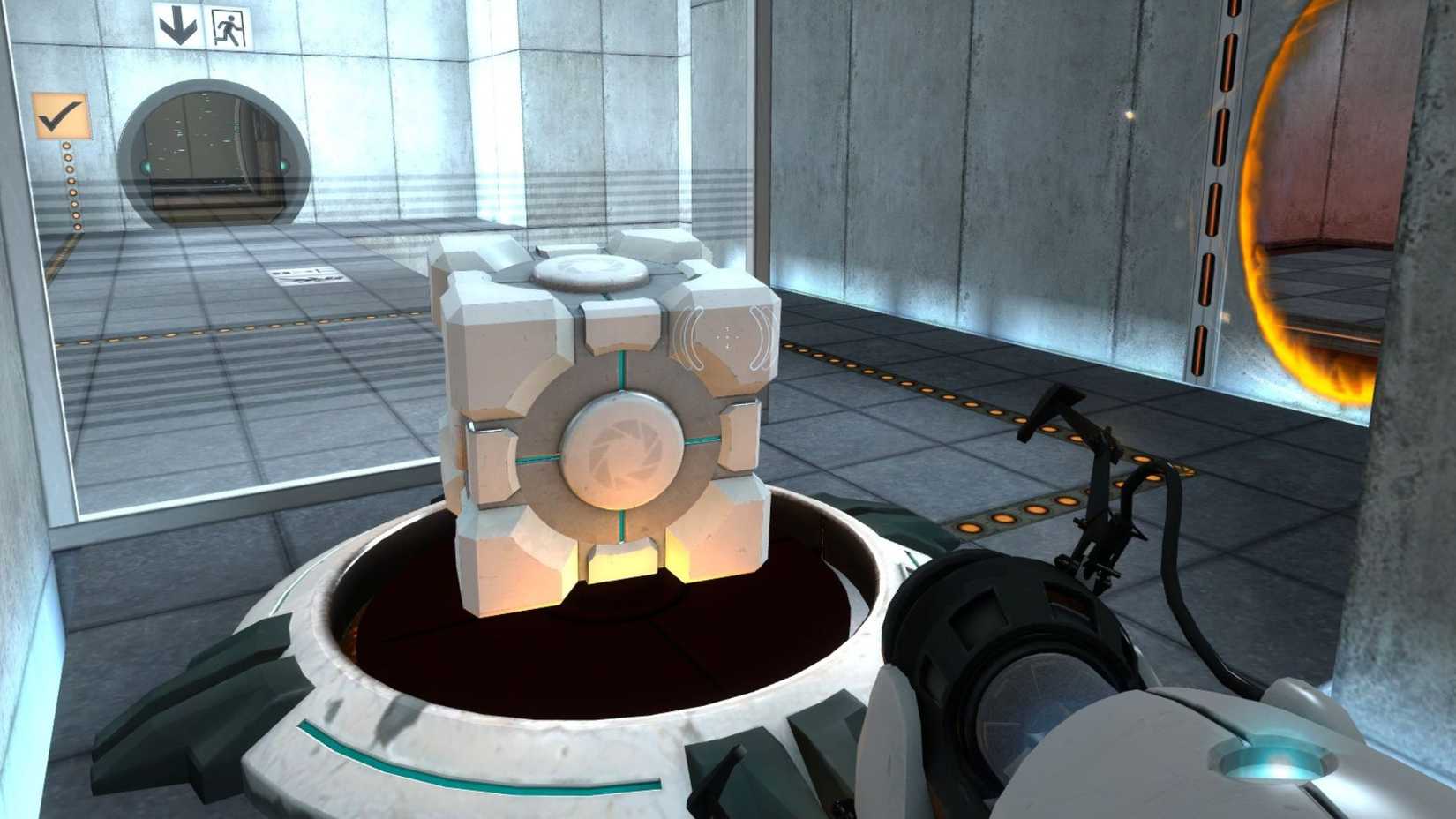 A player holding a portal gun placed a companion cube on a platform near the portal.