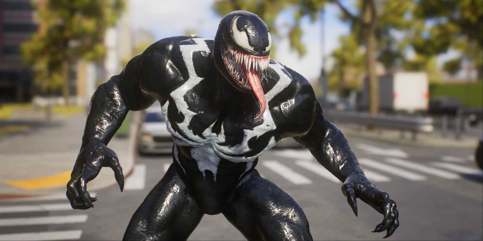 A close-up of the Venom suit mod looking menacing on a sunny street in Marvel's Spider-Man 2.