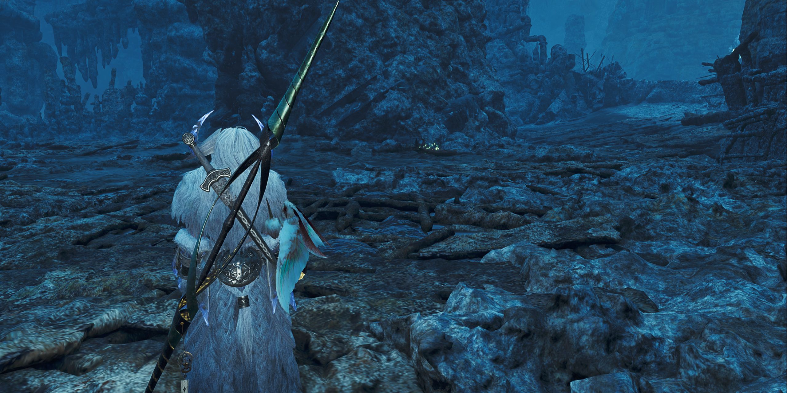 The Hunter standing showing an Artian Insect Glaive equipped in Monster Hunter Wilds.