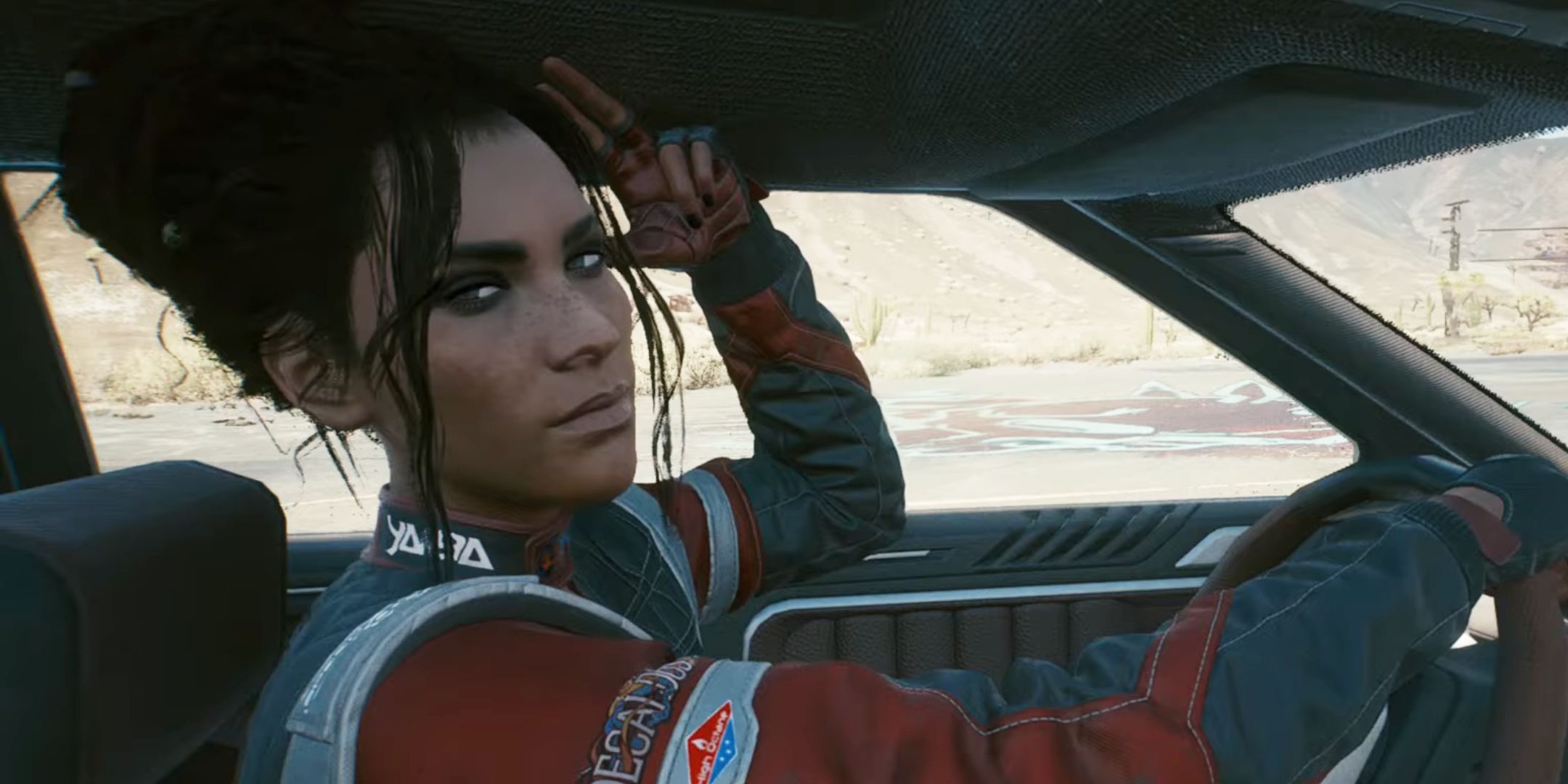 Panam Palmer talking to V while driving in Cyberpunk 2077.