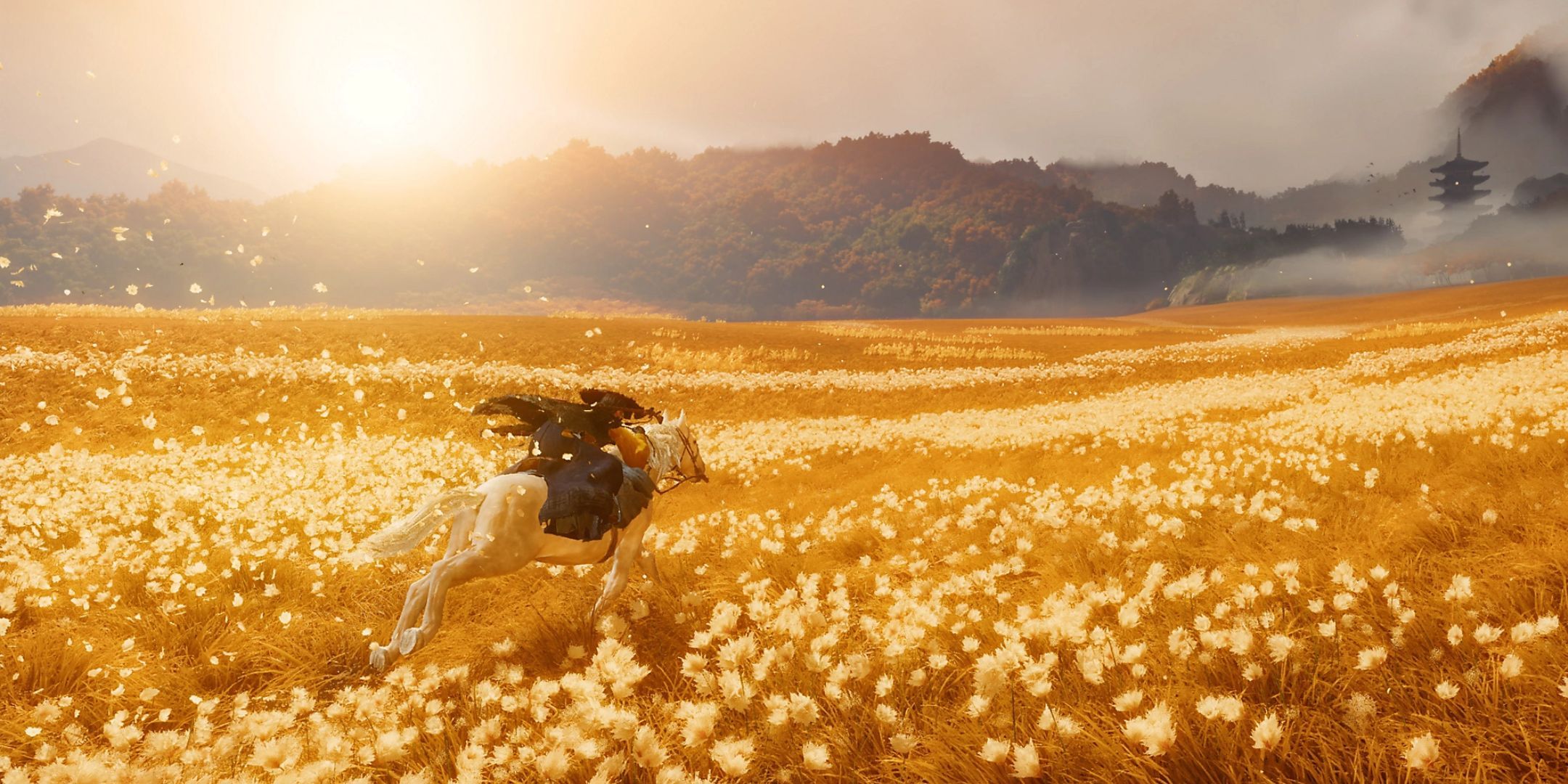 Atsu riding a horse in a golden field in Ghost of Yotei.