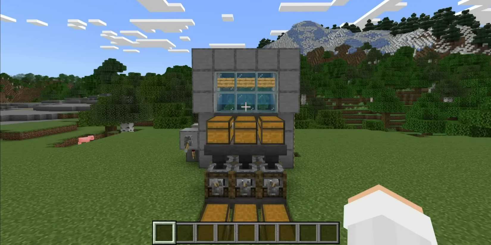 Machine to fuel kelp blocks, consisting of smooth stone, double chests, hoppers and kelp behind the class, among others in Minecraft.