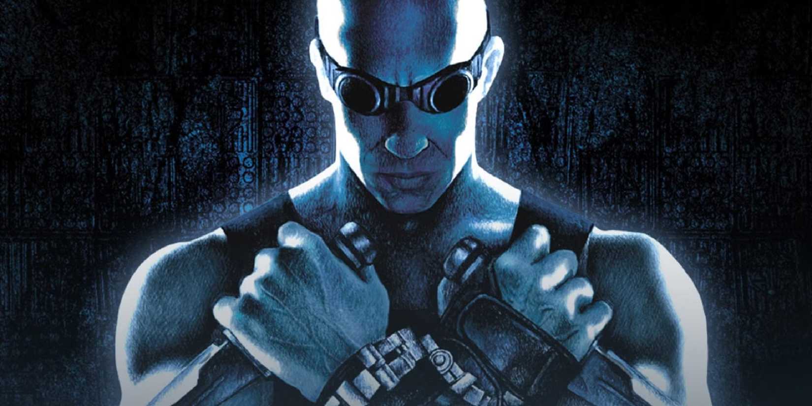 Riddick holds his dagger to his chest from The Chronicles of Riddick.