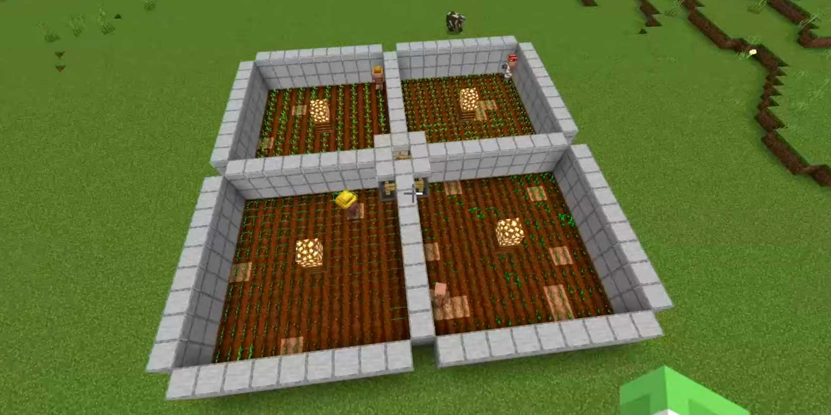 A farm run by villagers consisting of four plots of land surrounded and divided by smooth stone walls, with a glowing stone in the center of each in Minecraft.