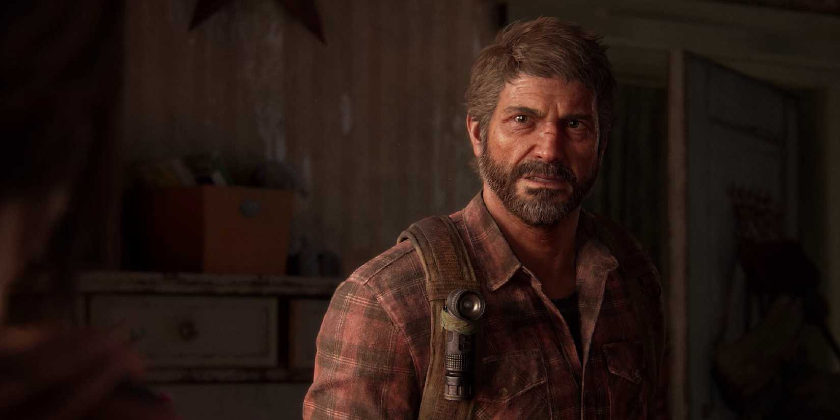 A close up of Joel from The Last of Us.
